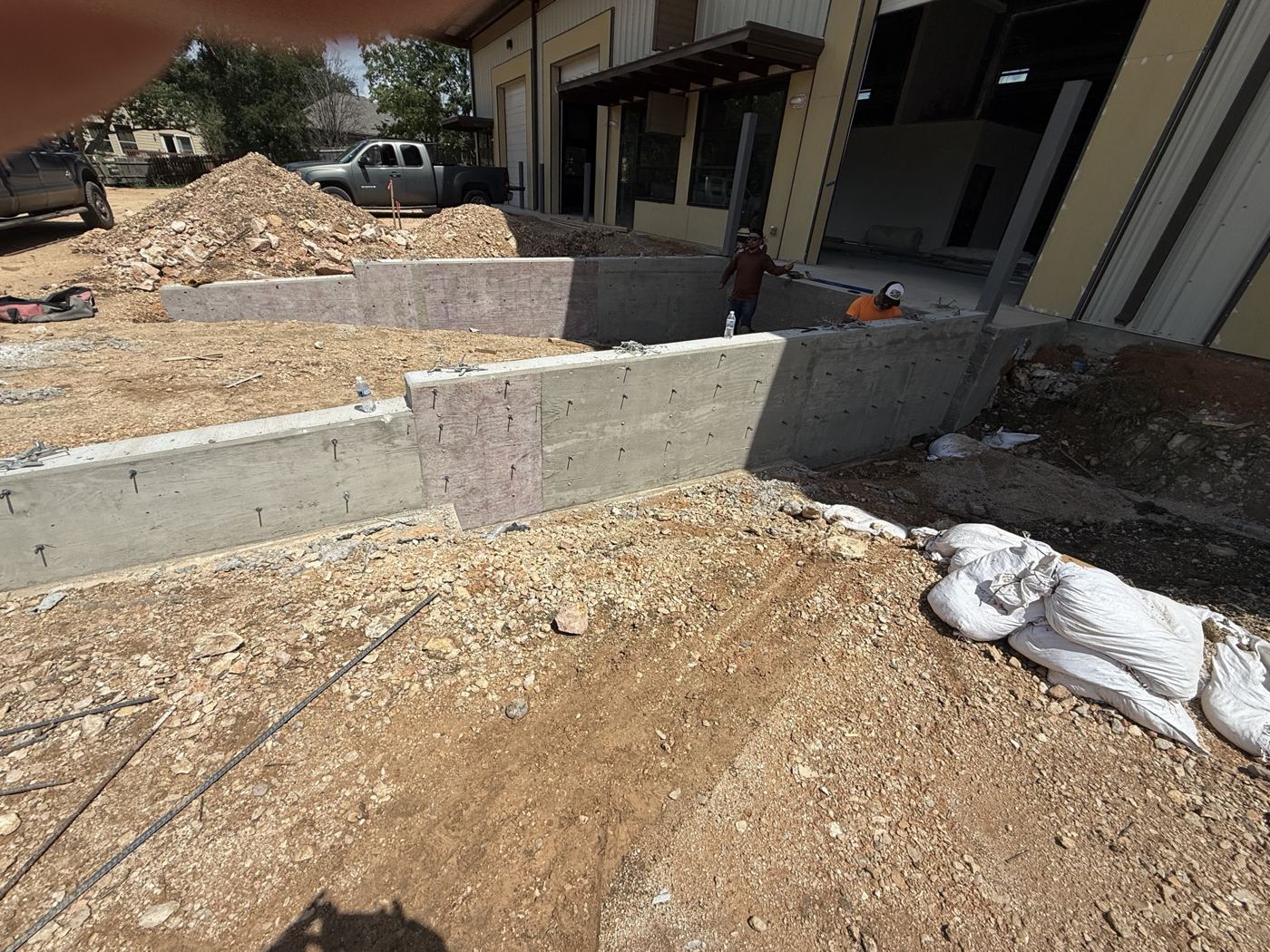 Finished concrete site walls, Avenue N commercial site work