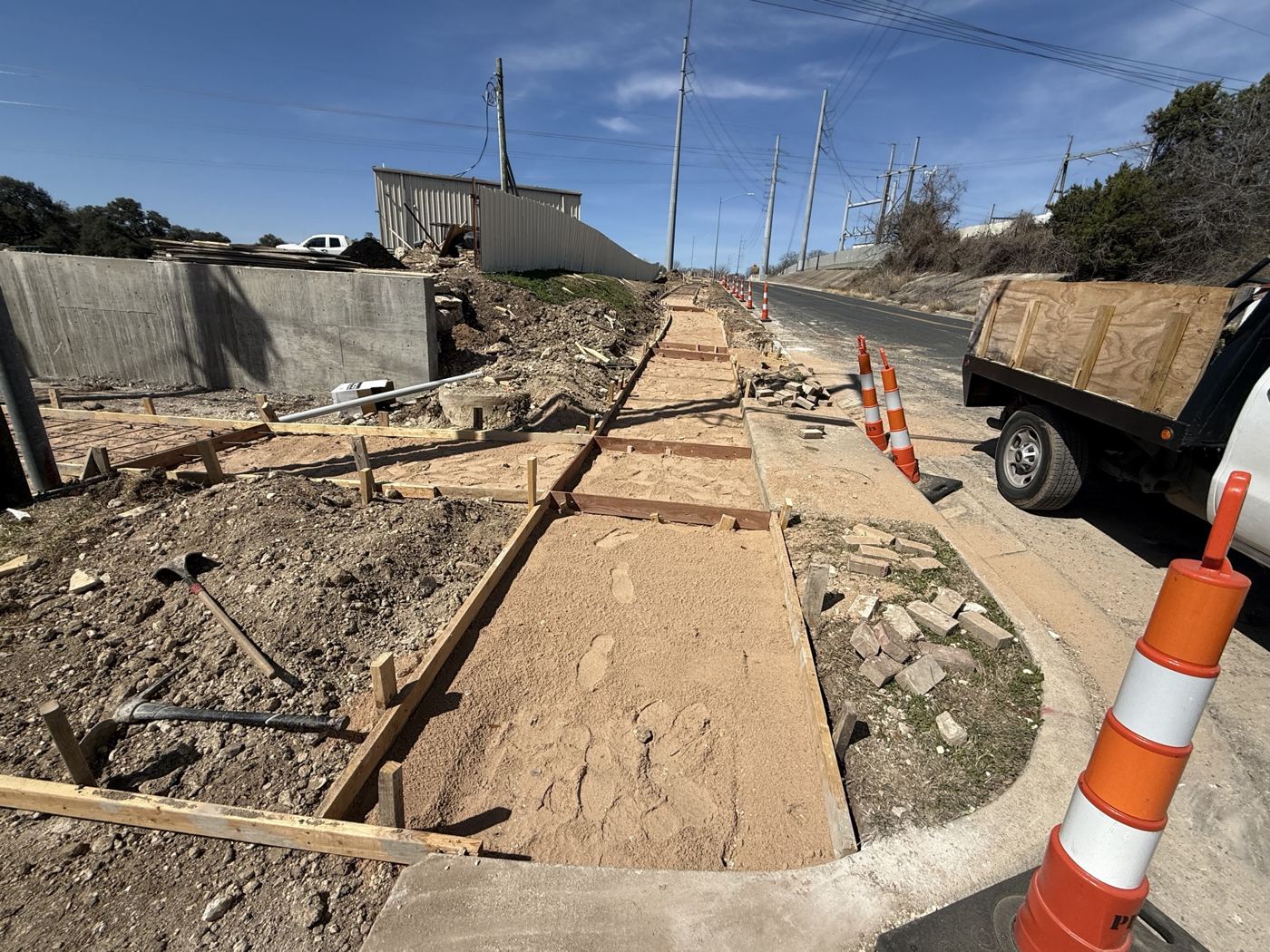 Sidewalk forms along the street, Avenue N commercial site work