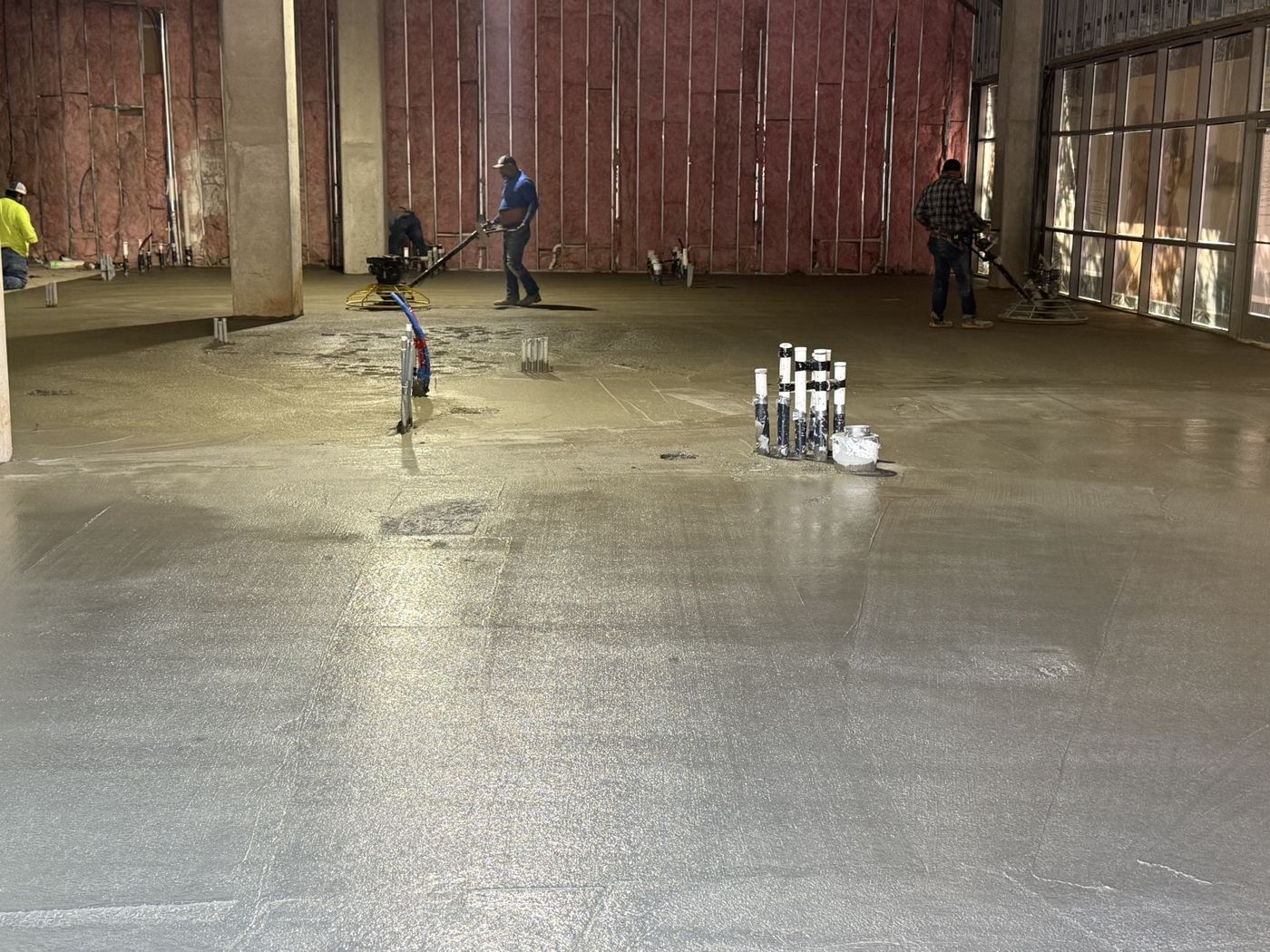 Crew finishing the interior slab, Wahoo's Fish Tacos South Shore build in Austin