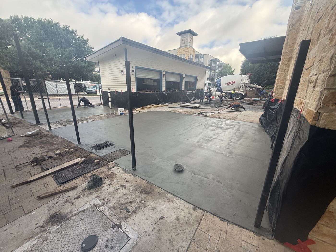 Patio concrete poured beside the building, Wahoo's Fish Tacos South Shore build in Austin