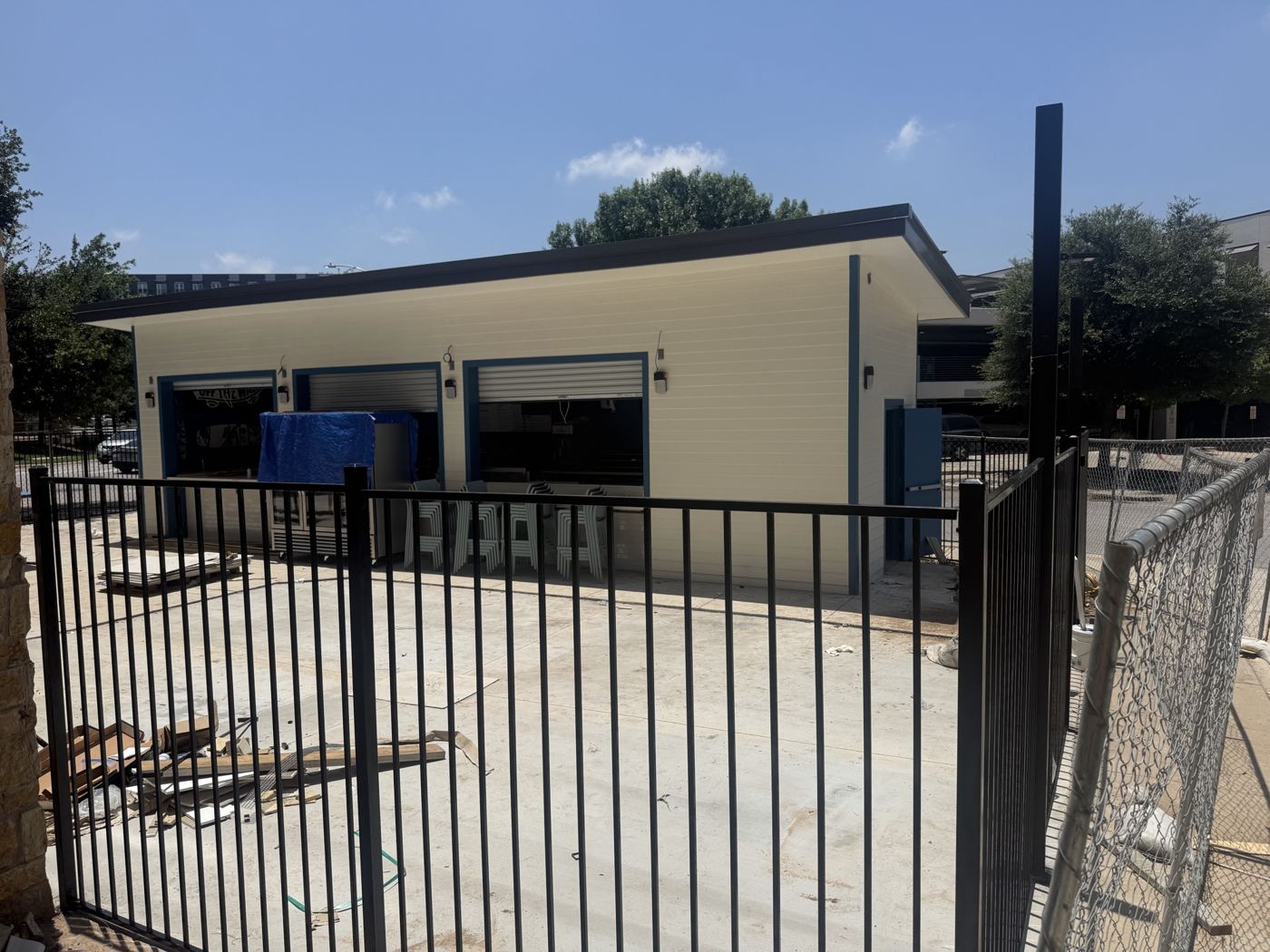 Perimeter fence installed, Wahoo's Fish Tacos South Shore build in Austin