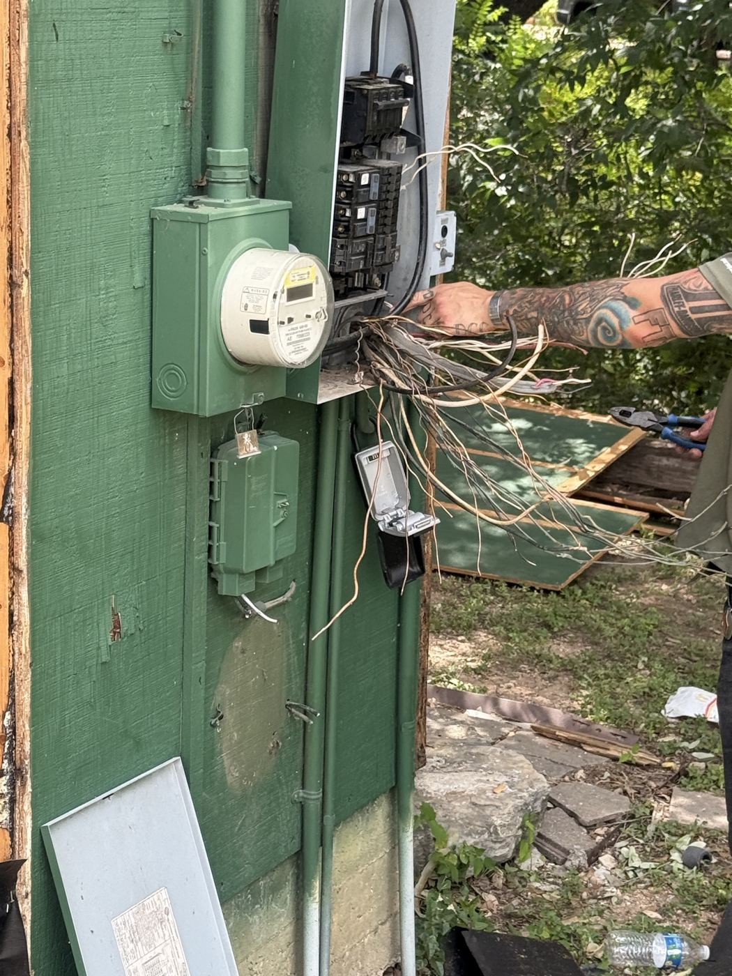 Old electrical service being removed, barn remodel on El Viejo Camino in Austin