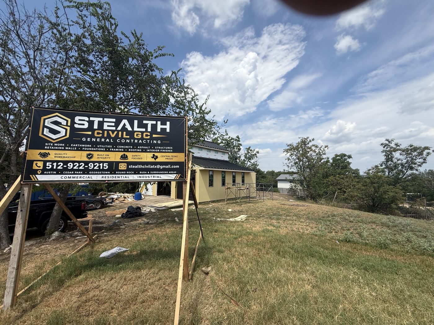 Stealth jobsite sign with the barn mid-remodel, barn remodel on El Viejo Camino in Austin
