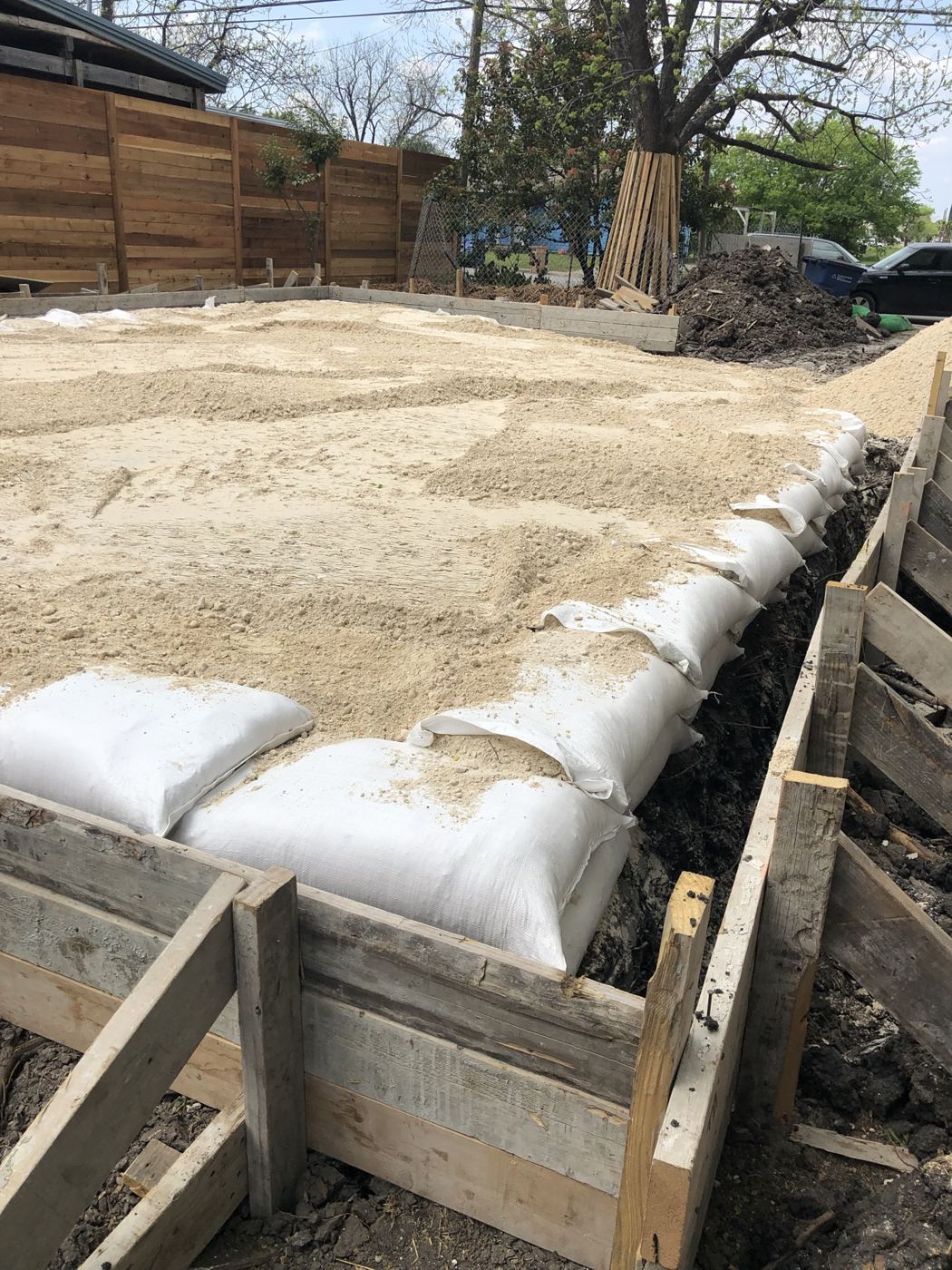 Foundation forms and beams, Vargas Street condos design-build in Austin