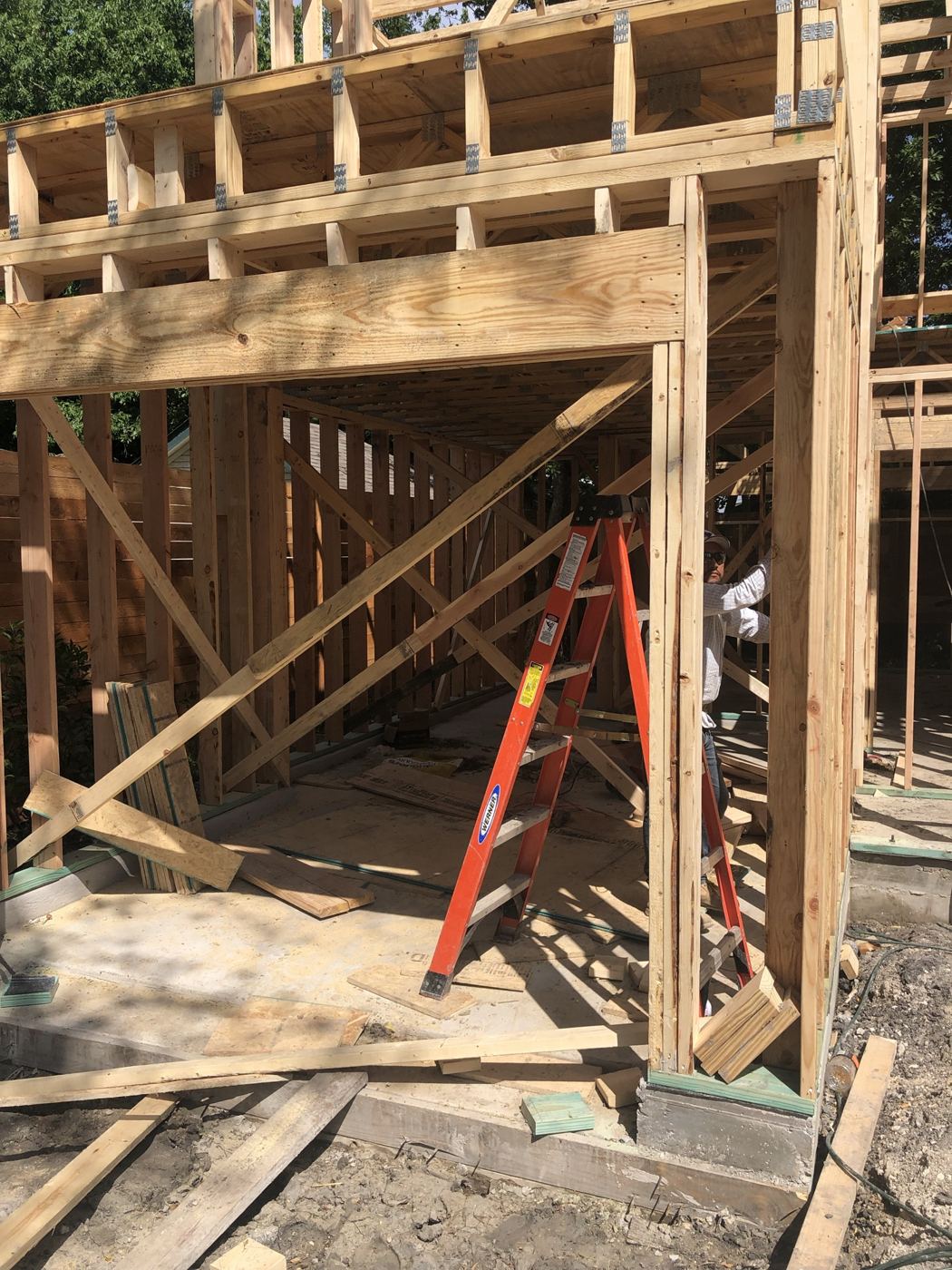 Framing the garage opening, Vargas Street condos design-build in Austin